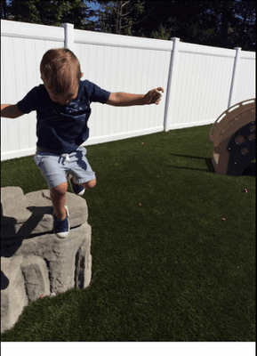 outside playground - rock climbing and jumping!