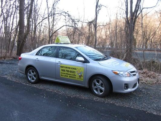 Students learn in a 2011 Toyota Camry