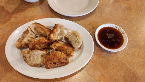 Homemade pork pot stickers. Excellent with or without sauce!