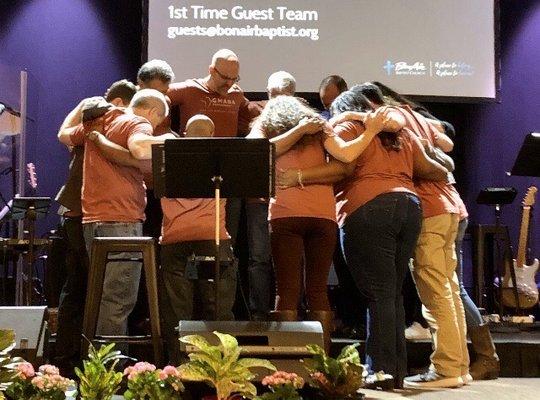 The 9:30 Service - Gathering Worship Team in prayer with Campus Pastor Mac Jordan.