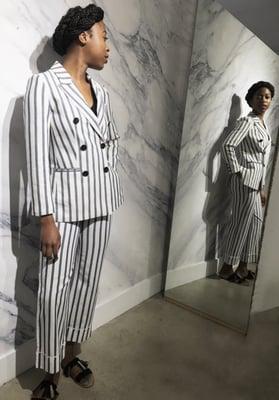 I fell in love with this power suit! Also, how cool is the marble fitting room?