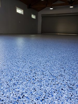 Epoxy flakes on garage floor