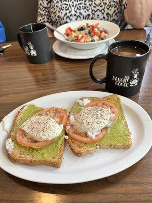 Avocado Toast with poached eggs and tomato, special - berry oats with walnuts and syrup