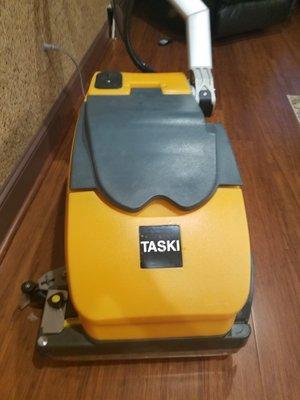 This is an auto scrubber which leaves your tile and hardwood flooring clean while leaving no wet area; drying as it goes. CONSISTENT