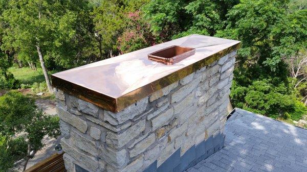 Copper chimney topper.