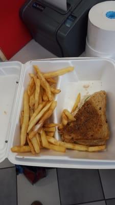 Half a tuna melt and fries