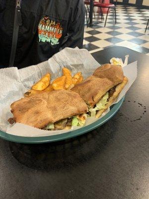 Steak and cheese grinder