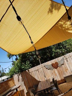 Outdoor patio is shady and seats large or small groups