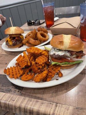 Shirley Temples In back: Meatloaf burger with onion rings  I'm front: Jalapeño popper burger with sweet potato fries