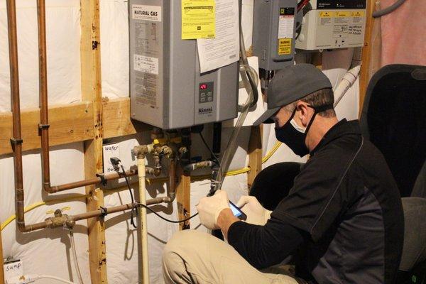 Inspecting the basement during a standard home inspection.