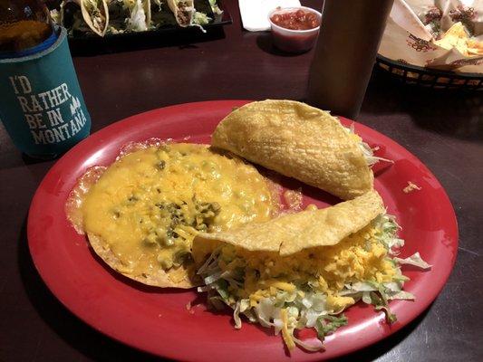 Two tacos and a jalapeño cheese crisp