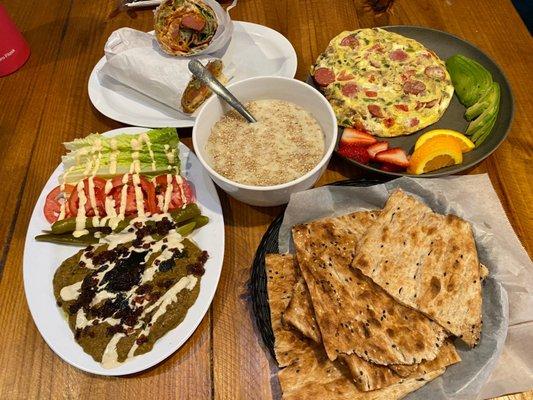 Top: Sossis Bandari Sandwich, The Whole Shebang omelet Center: Halim (Weekends Only) Bottom: Eggplant dish comes with Sangak bread