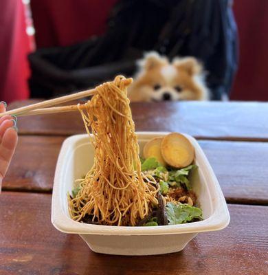 Momo Spicy Noodle: Egg noodles w/ spicy pork, signature chili oil sauce, sichuan peppers, wood ear mushrooms | $14.95 + $2.50 egg