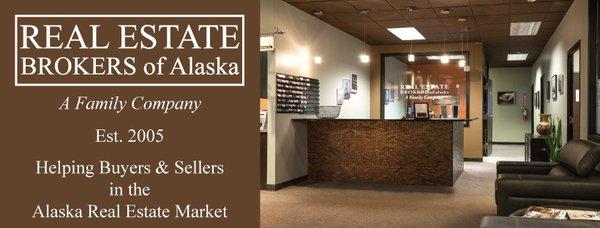 Real Estate Brokers of Alaska.  1577 C Street #101, Anchorage, Alaska.  Real Estate Brokers of Alaska Logo.