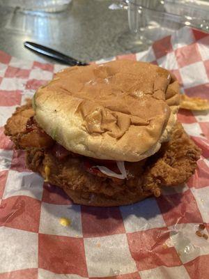 Fried chicken sandwich with bacon.