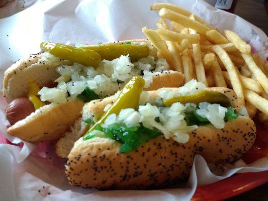 Hotdogs are served with onion, relish, mustard, ketchup, and hot peppers. You can also get a Chicago dog