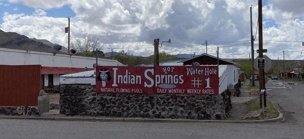 Sign on the road advertising the hot spring baths