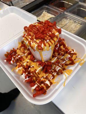 elote chorreado with hot cheetos