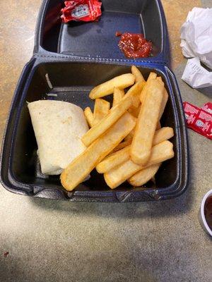 Shrimp Caesar wrap with French fries.