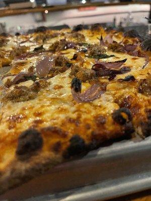 Sausage and onion pizza.