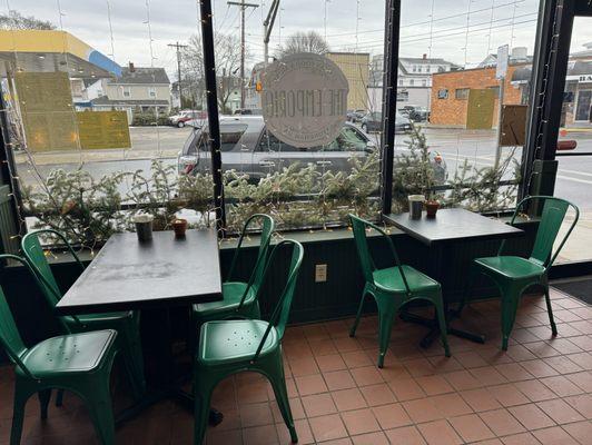 Couple of tiny tables for eating inside