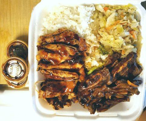 6/2021 - Grilled Rib & Chicken combo with white rice, steamed cabbage, carrot and broccoli. Good portion size, good flavor.