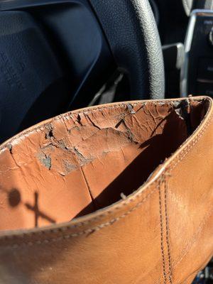 Melted and damaged side compared to other boot with normal wear-and-tear.