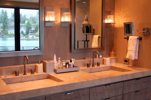 Marble vanity and sinks blend seamlessly together.