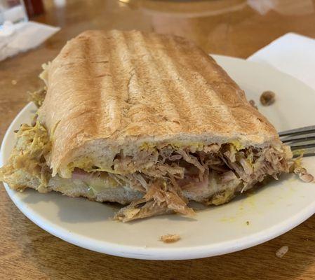 Half a Cuban sandwich, I cut it wrong, it doesn't look good, but it was delicious.