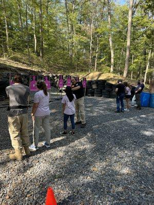 Impressive young ladies training at the outdoor gun range.