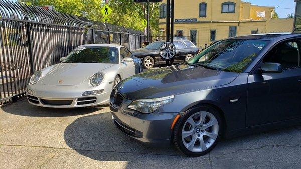 Freshly serviced Pprsche 911 and BMW 535i washer and ready to head home.