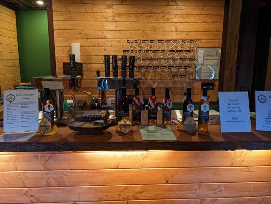 Bar and bottles with a small number of our 190 awards displayed.