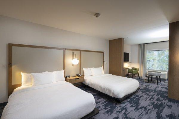 This is a double queen suite room. It features an additional sleeper sofa and TV.