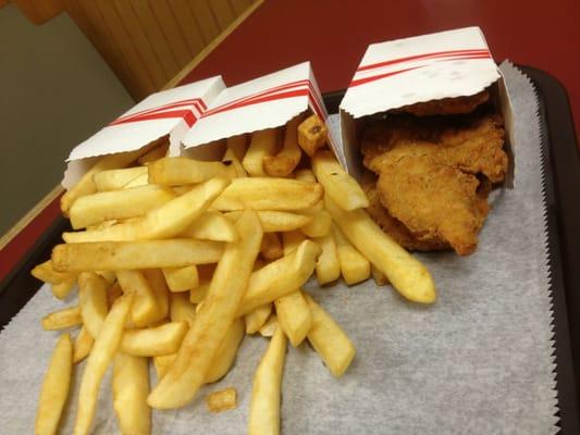 Kids chicken fingers and fries.