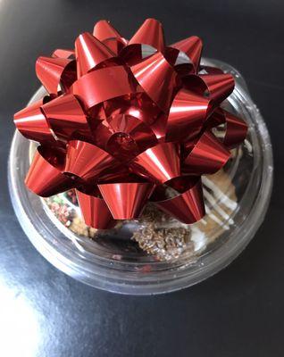 Beautiful presentation and stay fresh container, delicious  variety of cookies topped off with a red bow.