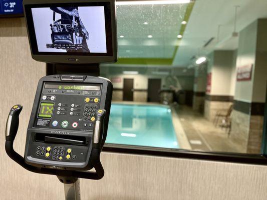 View of pool from fitness center.