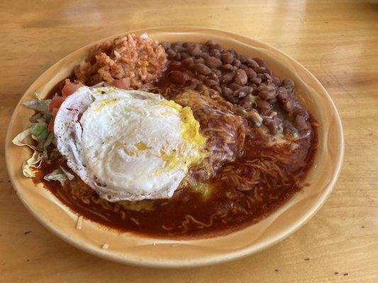 Joann's Ranch-O-Casados.  Stacked shredded beef enchiladas with red chile and topped with an egg.