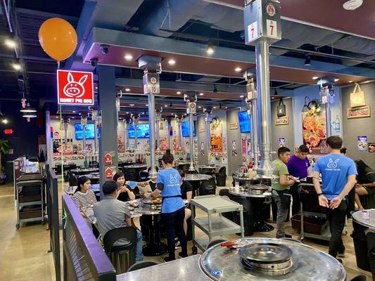 Inside / Interior of restaurant - clean, bright, inviting, K-pop playing on the wall tvs, fun ambiance, authentic Korean, excellent service