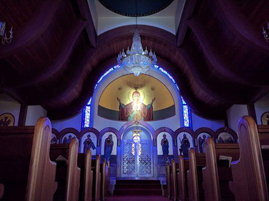 Twice a year, at sunset in spring and fall, light streams through the narthex doors, perfectly illuminating the apse icon.