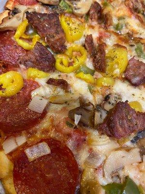 "All the Way" pizza, no anchovies- added banana peppers. Best thin crust, edge-to-edge pizza in Columbus.