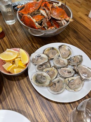 Cooked crabs and self shucked oysters. Provided by Anastasi