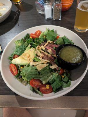 Steak salad. Steak was minimal but the homemade cilantro dressing was delicious.