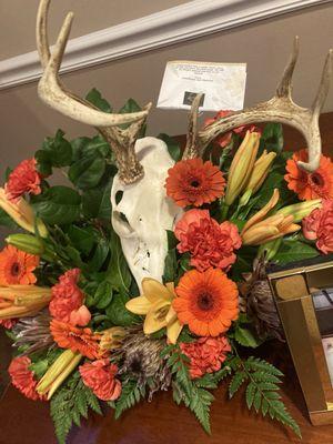 Orange and brown hunter's bouquet with antlers