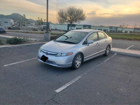 After picture- New bumper, restored headlights, and clean car