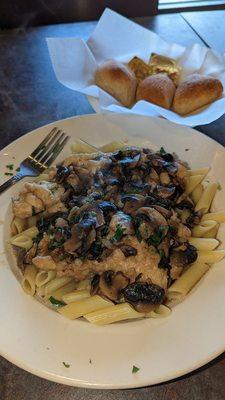 Chicken Marsala and penne pasta lunch special with fresh warm rolls.