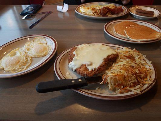 Chicken Fried Steak and Eggs with Pancakes 11.00 Fast Break Special in the back 6.25