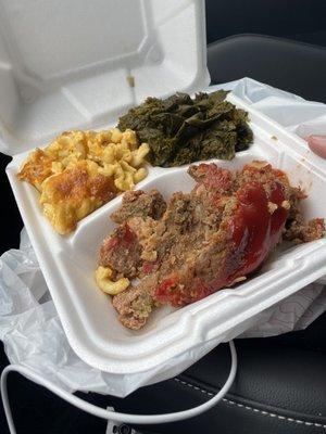 Meatloaf, greens, and macaroni and cheese.