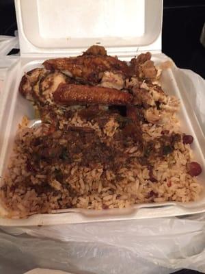 Jerk chicken with rice and peas and oxtail gravy