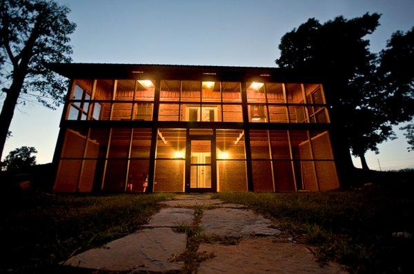 Lake House cabin with a screened in deck and patio.