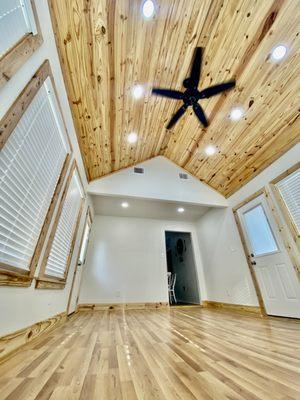 This beautiful room remodel highlights the natural wood in the space!